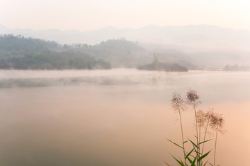 Scenery of Pa Khong Lake in the morning mist.