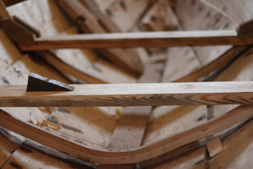 Wooden boat in the barn