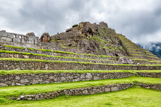 Temple of the Three Windows and Intiwatana in Machu Picchu, Peru.
