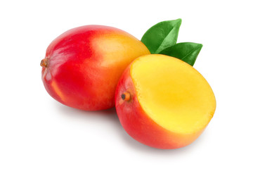 Mango fruit half with leaves and slices isolated on white background close-up