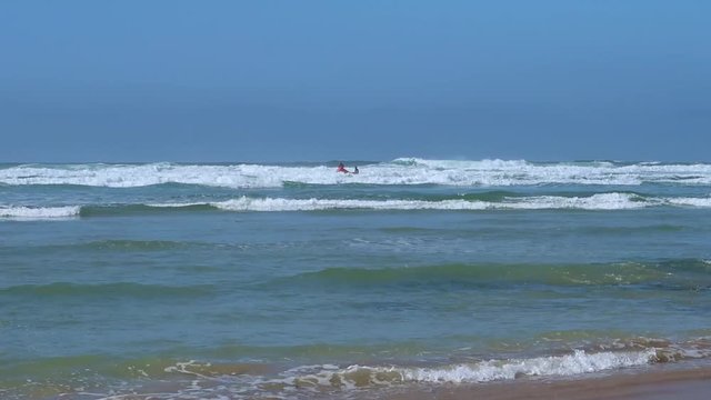 Lifeguards in an inflatable rescue boat (IRB) in Cornwall, UK