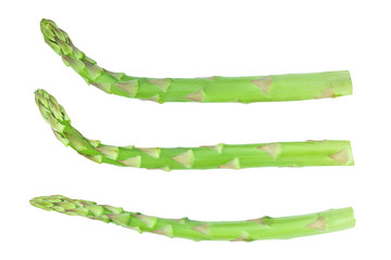 Fresh sprouts of asparagus isolated on white background. Top view. Flat lay