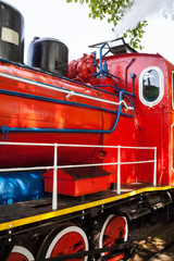Old red steam locomotive.