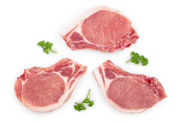 sliced raw pork meat with parsley isolated on white background. Top view. Flat lay
