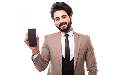 Portrait of arab handsome delightful confident focused with toothy smile seller recommending to buy new digital gadget device isolated on gray background