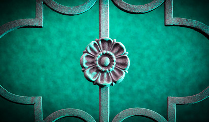 Elements of a metal gate, forged flower.