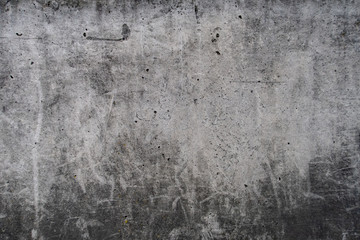 Concrete surface with scratches, markings, lines, blazes, staines and cracks