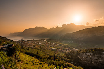 View on torbole in south tirol at garda lake in sundown with warm light and a beautyfull clear sky