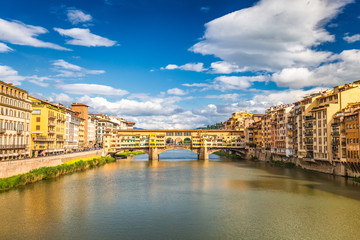 Plakat The Ponte Vecchio, medieval stone old bridge over the Arno River in Florence, Italy.