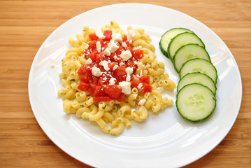 Elbow Pasta Served with Diced Tomamtoes and Cheese & Sliced Cucumber