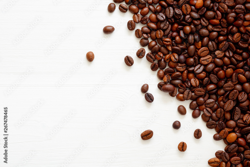 Poster Coffee  beans isolated on white background with copyspace for text. Coffee background or texture concept.