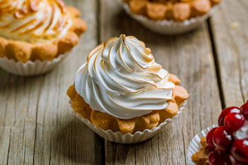 tartlet with lemon on wooden background