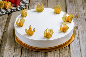 cheesecake cake with cottage cheese on wooden background
