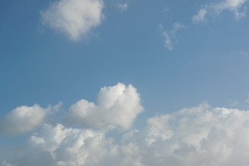 Naklejka na ściany i meble blue sky with white clouds on a sunny day
