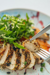 Grilled pork fillet with arugula salad