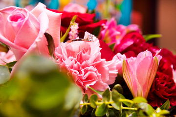 Fototapeta na wymiar bouquet of flowers and wedding ring 