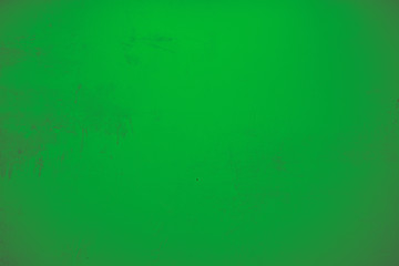 Leuchtend grüner Hintergrund, Steinwand in knalligem grün und leichtem Farbton Verlauf.