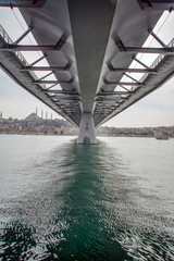 Golden Horn view of new built Halic Metro Bridge, vintage filter applied    