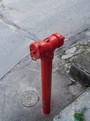 Red fire hydrant on the island of Phangan. Thailand
