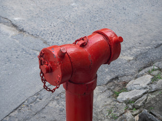 Red fire hydrant on the island of Phangan. Thailand
