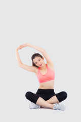 Beautiful portrait young asian woman sitting stretch muscle arm isolated on white background, girl wear sport clothes exercise and yoga for health, wellness concept.