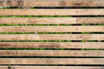 Close up of old brown wood lath with natural striped background and texture.