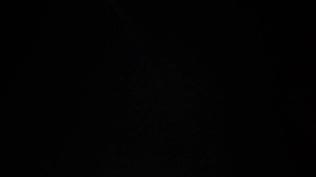 Fire cloud in slow motion isolated on black, 500 fps