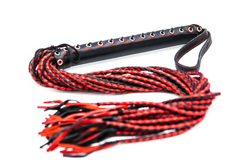 Leather whip isolated on white background. Sex toy for intimate perversions. Sex slavery.