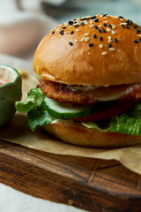 Cheese Burger. With french fries lettuce, tomatoes