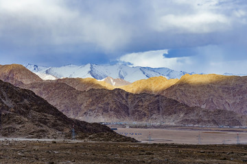 Panorama of the beautiful mountains that surround Leh at sunlight - Ladakh, Jammu and Kashmir, India.