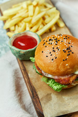 Cheese Burger. With french fries lettuce, tomatoes