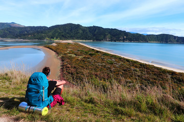 Fototapeta premium Tramping in Abel Tasman national park, Abel Tasmam Coastal track, New Zealand, Great Walk
