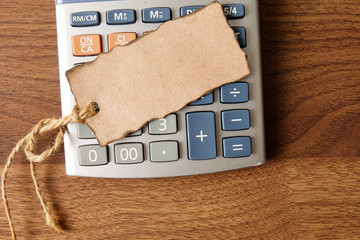 Torn book mark on calculator. Copy Space