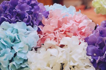 beautiful Background of artificial flowers Close up