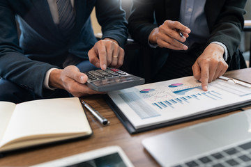 business people and coworker colleagues discussing explanations about week working plan project cooperating in modern coworking office.