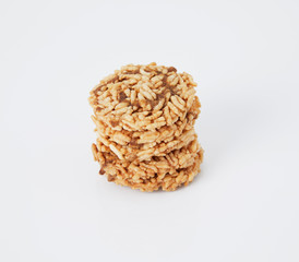 Thai Sweet Crispy Rice Cakes with Cane Sugar Drizzle, on white background