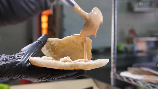 Doner kebab garlic sauce spread footage