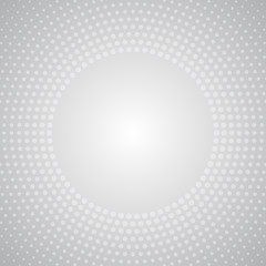 Halftone radial dots background in modern style on grey background.