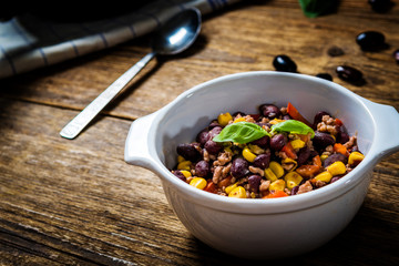 Chili corn carne on wood table