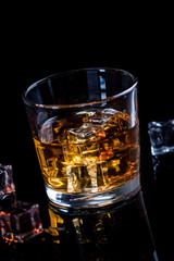 Whisky, whiskey or bourbon with ice
