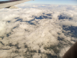 Fototapeta premium The beautiful blue sky and white cloud from the plane In Thailand
