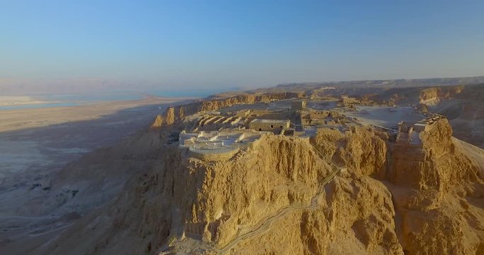 AERIAlL Pull back from Masada with the Dead Sea in  the background