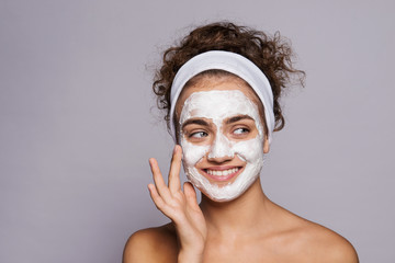 A portrait of a young woman with mask in a studio, beauty and skin care.
