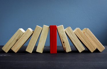 Successful leadership in business concept. Red and white wooden blocks.