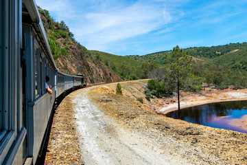 A train ride in the Rio Tinto River Valley originally used by miners.