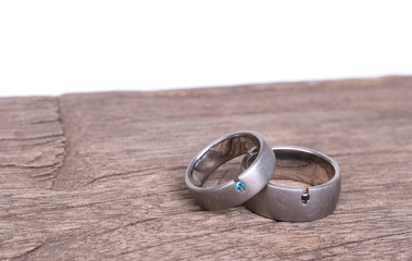Wedding rings on old wood