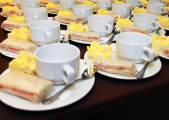 The empty coffee cup sets with bakery for break meeting time