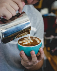 Fototapeta na wymiar Pouring latte art