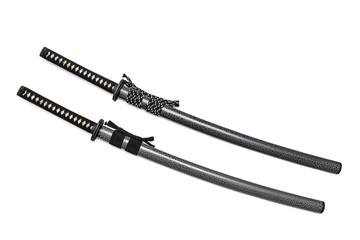 2 Japanese swords and scabbard with black and two-tone cord isolated in white background.