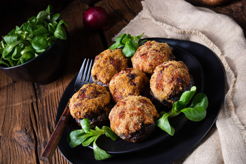 stuffed with minced meat and baked Champignons